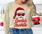 You Just found the cutest Christmas sweatshirt for the holiday season! This cozy Leopard Santa's Favorite Christmas Sweatshirt is perfect for kids and adult or a mommy and me matching Christmas sweatshirt