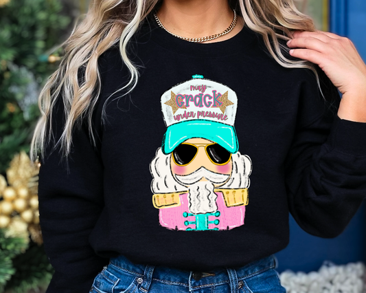You Just found the cutest Christmas sweatshirt for the holiday season! This cozy Preppy May Crack Under Pressure Nutcracker&nbsp;Christmas Sweatshirt is perfect for kids and adult or a mommy and me matching Christmas sweatshirt
