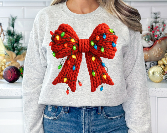 You Just found the cutest Christmas sweatshirt for the holiday season! This cozy Red Faux Yarn Bow with Lights Christmas Sweatshirt is perfect for kids and adult or a mommy and me matching Christmas sweatshirt