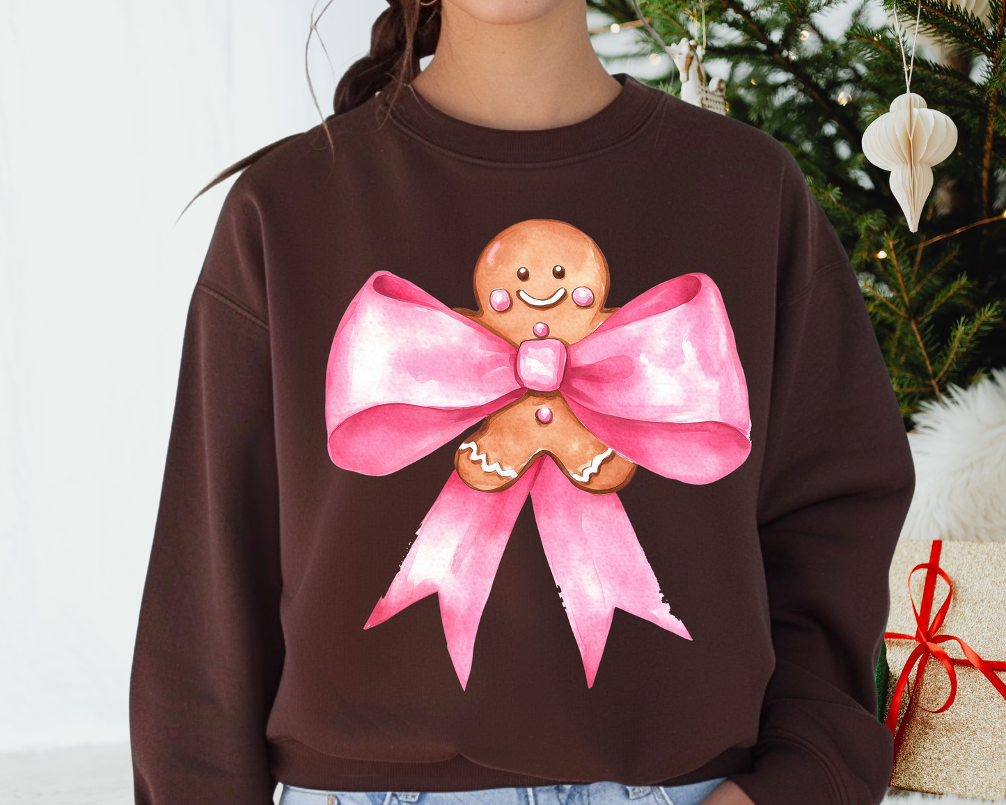 You Just found the cutest Christmas sweatshirt for the holiday season! This cozy Gingerbread with Bow Sweatshirt is perfect for kids and adult or a mommy and me matching Christmas sweatshirt